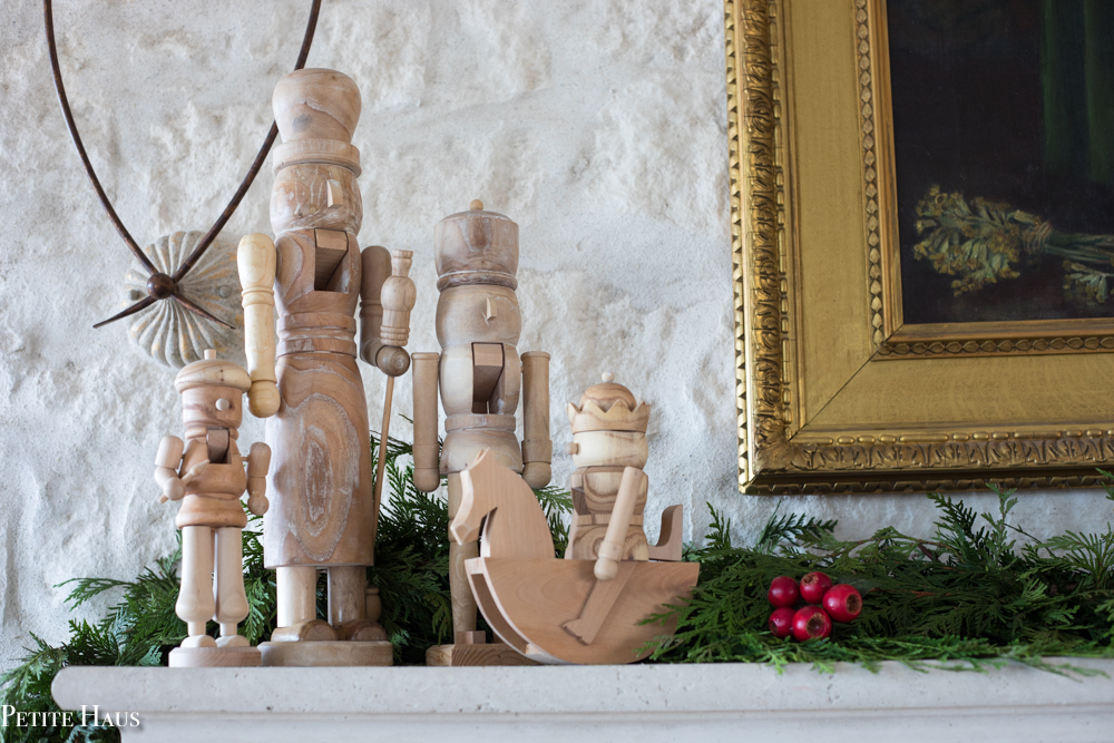 natural wooden nutcrackers on farmhouse Christmas mantel