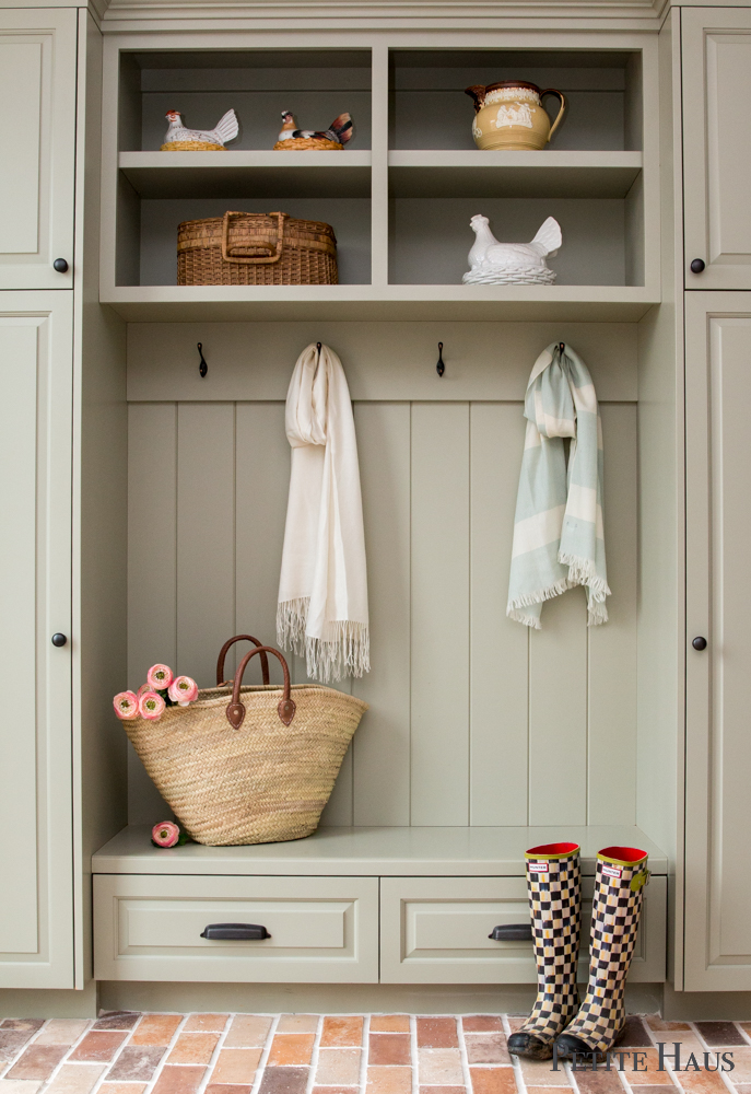 Farmhouse mudroom with brick floors