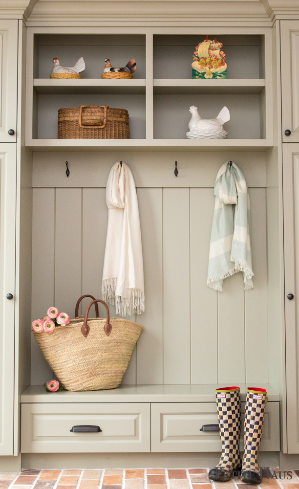 Farmhouse Mudroom with brick floors and hen on nests