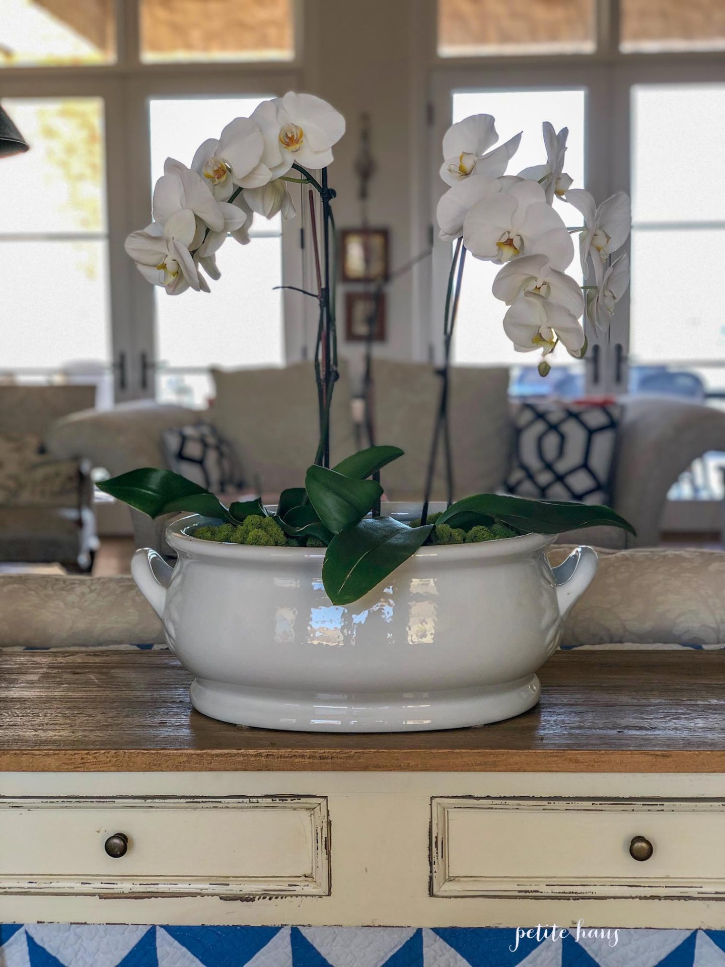 DIY orchid centerpiece in white ironstone bowl